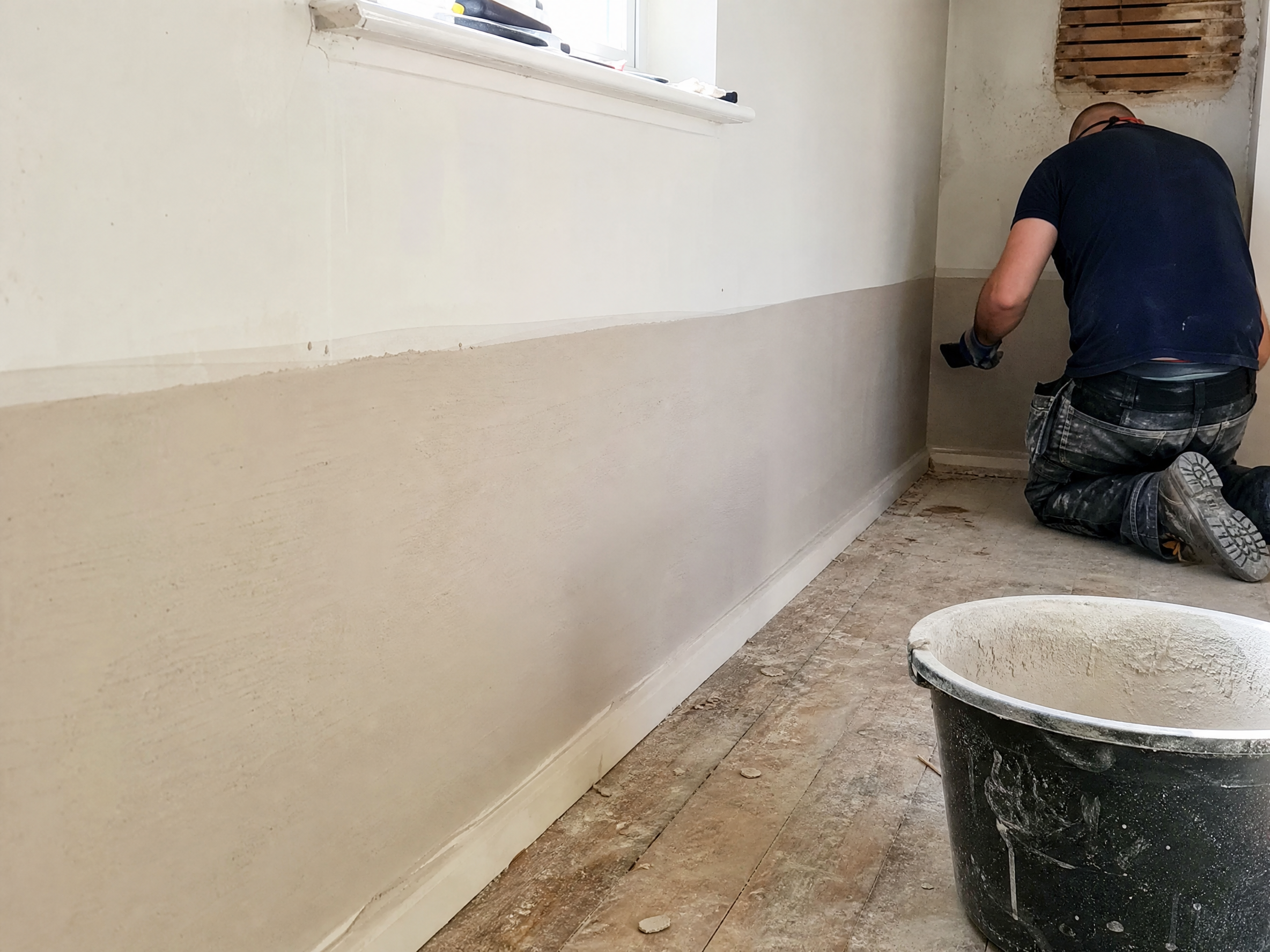 Completed rising damp treatment showing professional quality workmanship in a British home